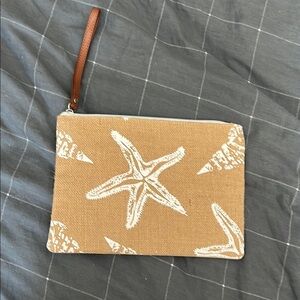 Tan and White Beach-Themed Clutch Wristlet